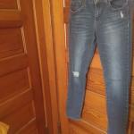 Dark faded distressed jeans