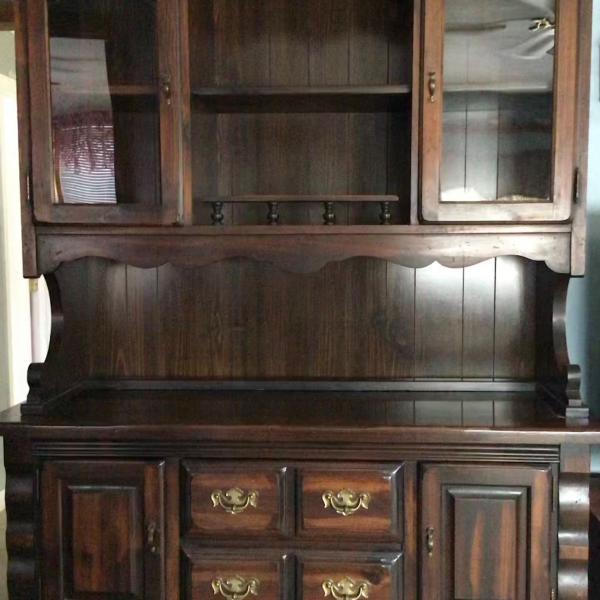 Photo of Nice pine hutch with doors and drawers.