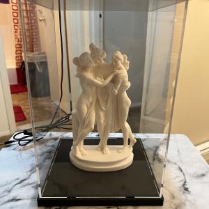 Photo of 3 Graces Goddesses of charm with display case with white light