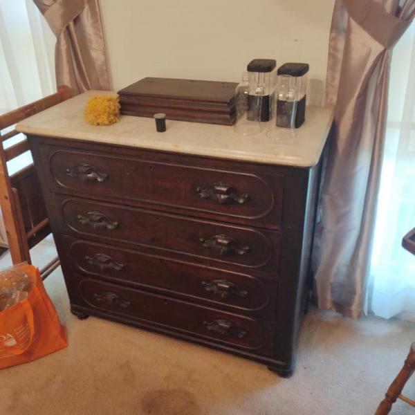Photo of Marble top dresser