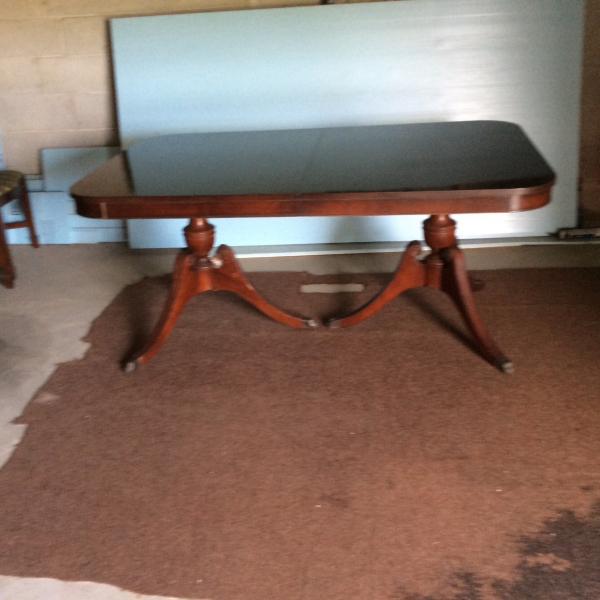 Photo of Duncan Phyfe dining table and 5 chairs, leaf and protective pads