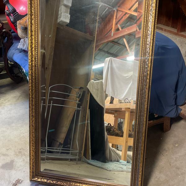 Photo of Beautiful gold framed beveled mirror