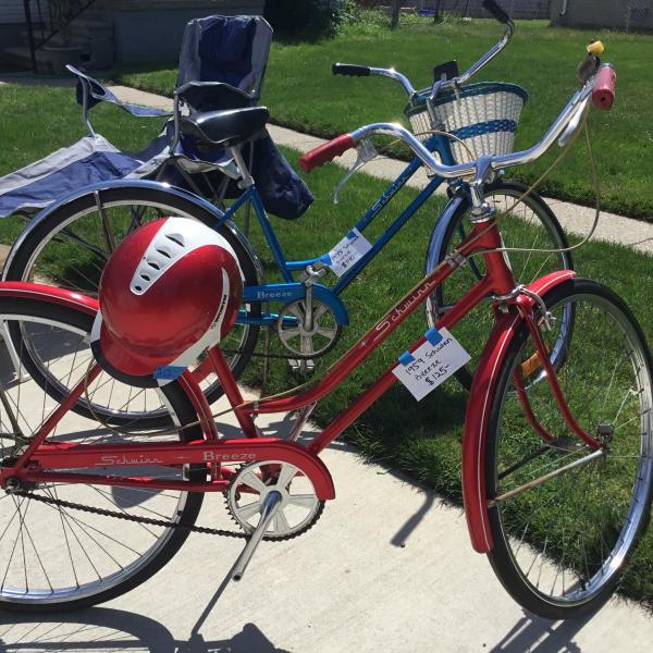 Photo of 1959 SCHWINN breeze bike, (red), and 1975 SCHWINN breeze bike (blue with basket)