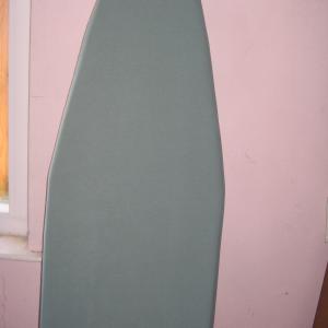 Photo of Ironing board with 2 irons