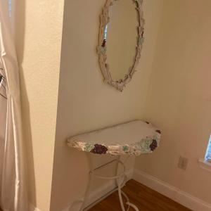 Photo of Entry way mirror and table