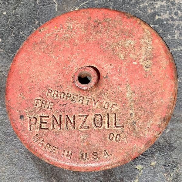 Photo of Vintage 1950s Pennzoil lollipop sign cast iron base
