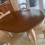 Maple kitchen table. Plus two leaves and five roller chairs 