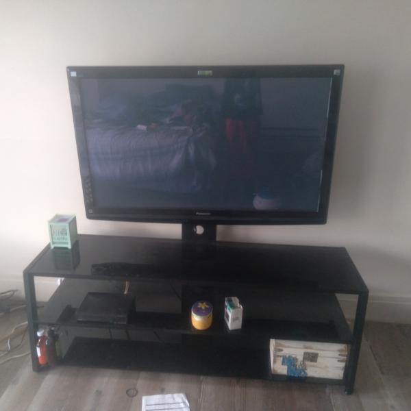 Photo of Great TV like new and glass stand plus more 
