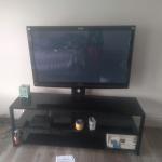 Great TV like new and glass stand plus more 