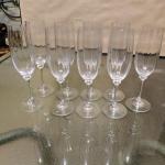 Set of 9 champagne flutes in excellent condition 