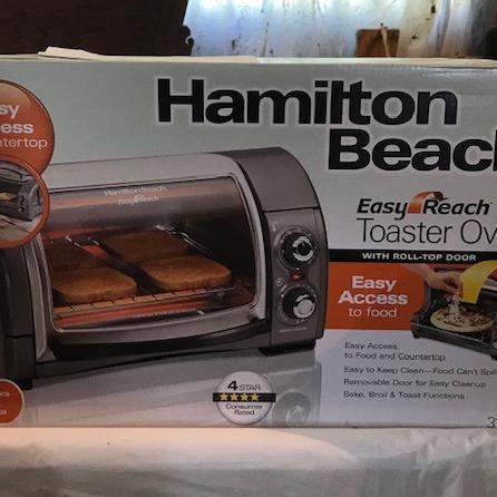 Photo of NEW in the box never used Hamilton Beach Roll Top Toaster Oven.  