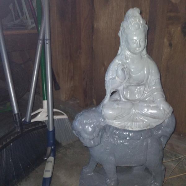 Photo of Geisha on a Dragon Statue