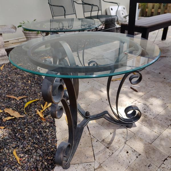 Photo of Two wrought iron & glass tables