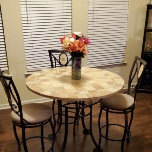Photo of STONE TABLE with 3 SWIVEL CHAIRS 