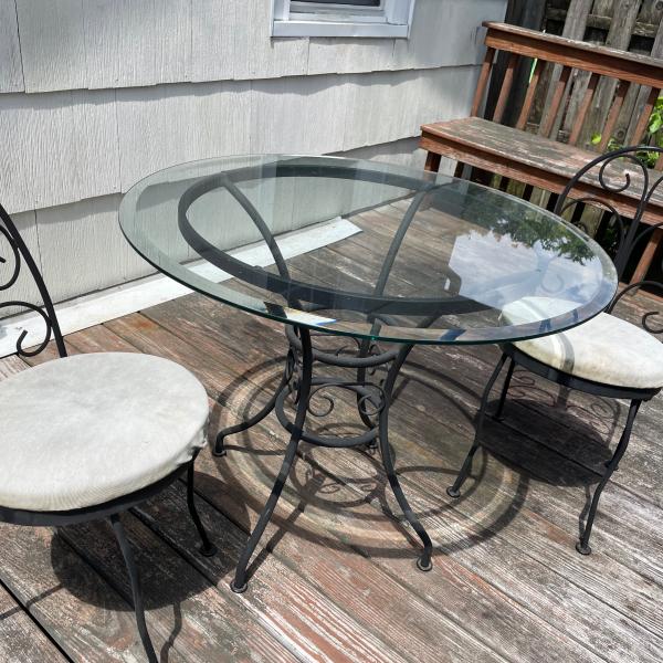 Photo of Glass table& 2 chairs. 
