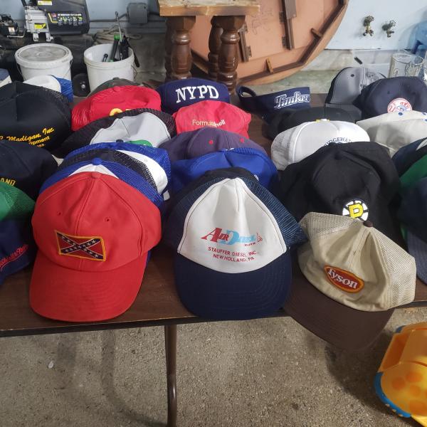 Photo of T-SHIRTS  and HATS