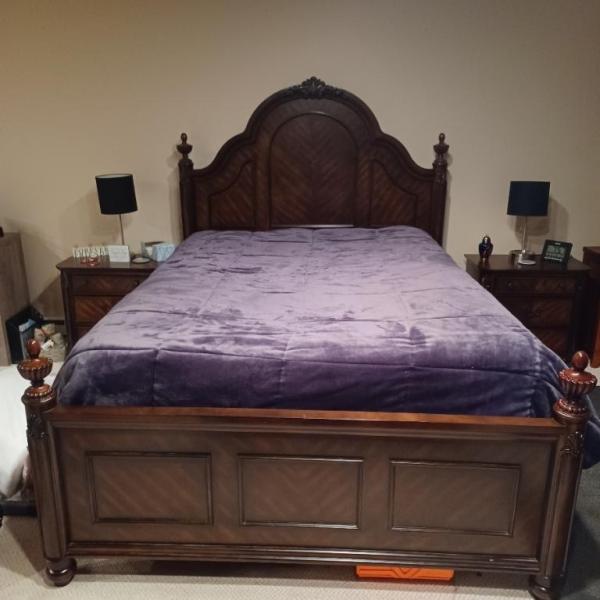 Photo of 7 year old Queen  size box spring , mattress head board abd foot board 