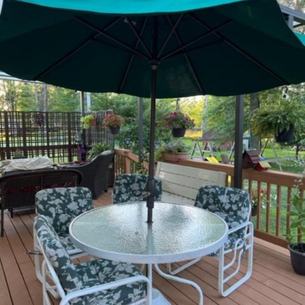 Photo of Umbrella table and chairs