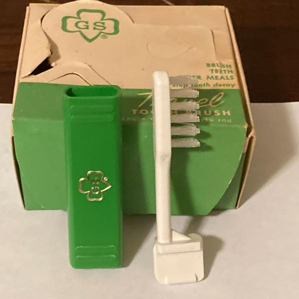 Photo of Girl Scout display box and 8 travel toothbrushes green/white
