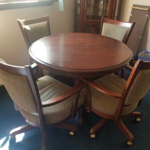 Photo of Round dining table with 4 chairs