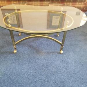 Photo of Glass and brass coffee table