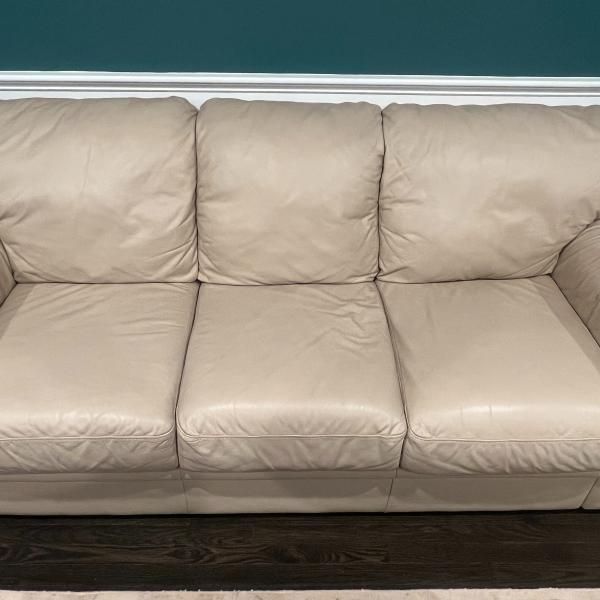 Photo of Leather Couch and Two Chairs