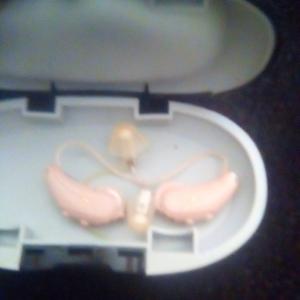 Photo of A PAIR OF HEARING AIDS 