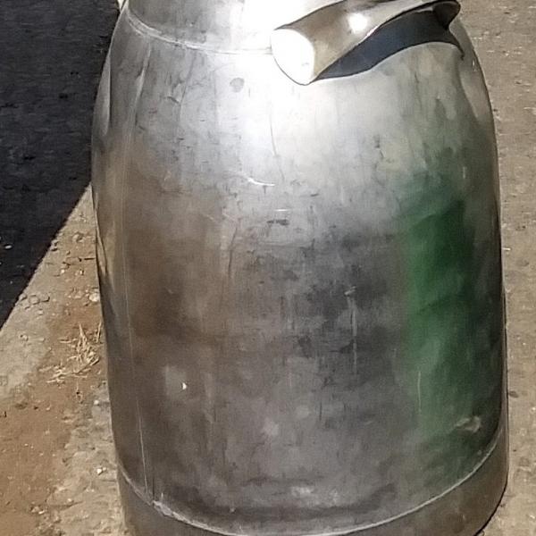 Photo of Vintage metal milk can