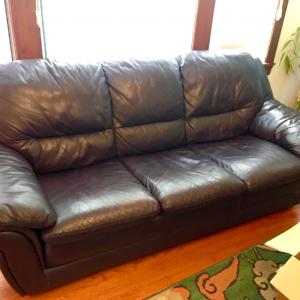 Photo of Purple Leather Comfy Couch