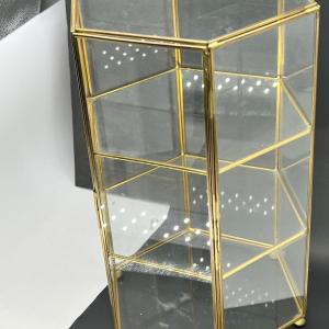 Photo of 6 sided three level glass display case