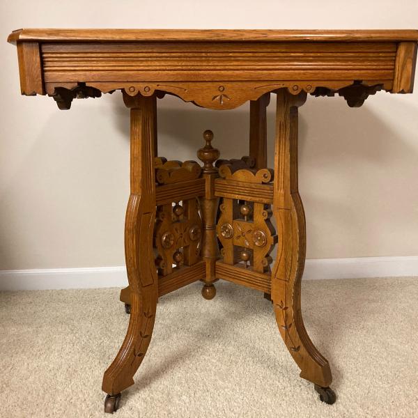 Photo of Antique side parlor table carving