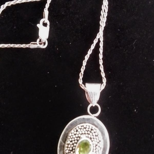 Photo of Peridot .925 sterling silver locket necklace