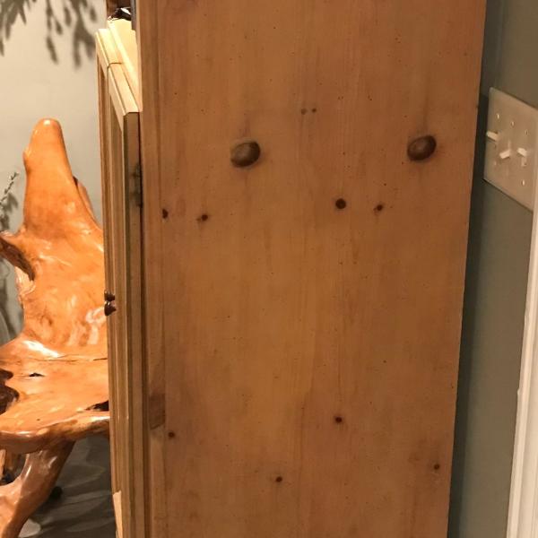 Photo of Unique Wood cabinet
