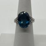 LOT 95: Sterling Silver 3.60 ct tw 5-Stone London Blue Topaz Ring - Size 6