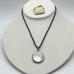 LOT 101: Set of Two Sterling Silver & Mother of Pearl Pendants with Cord Necklac