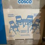 Cosco table and 4 chairs in box