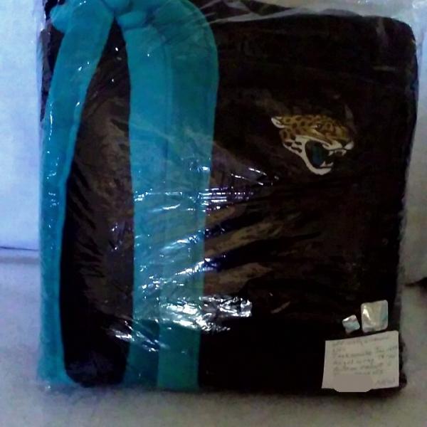 Photo of New Officially Licensed NFL Jacksonville Jaguars Angel wrap throw