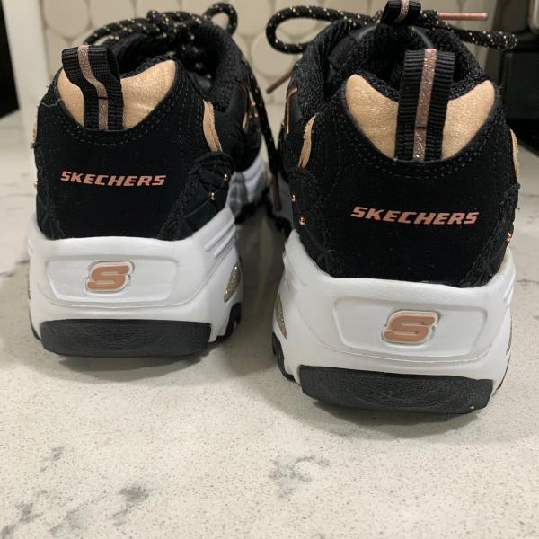 Photo of Skechers Black and Gold Size 8 1/2