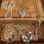 Faux pearl jewelry in wooden box