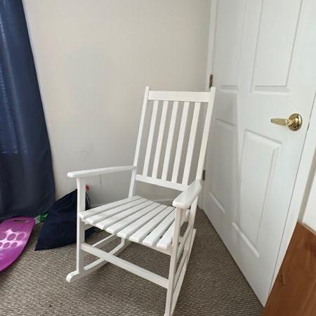 Photo of White rocking chair 