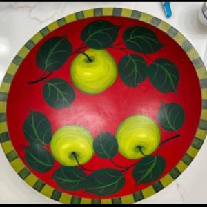 Photo of Red Sherwood Forest Design Tree Spirit 12” Wooden Bowl With Green Apples.