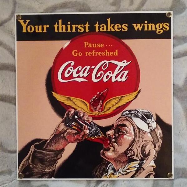 Photo of Coca-Cola Your Thirst Takes Wings Porcelain Enameled Sign