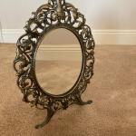Ornate vanity mirror.