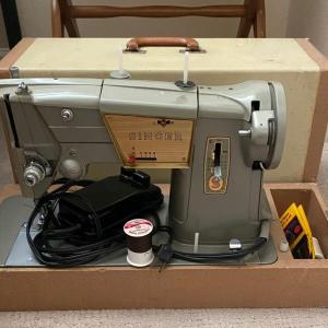 Photo of Singer Sewing Machine - vintage mid 1960's (with button hole attachment)