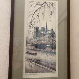 Photo of Two Framed Scenes of Paris Prints: Notre Dame and the Arc de Triumph 
