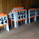 SALE signs for sale. Near 109th Ave. and University Ave.