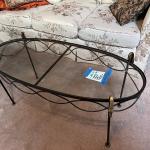 42" oval metal and glass coffee table