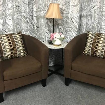 Photo of Pair of Brown Chairs