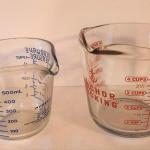 Lot #57  Anchor Hocking 4 Cup, Pyrex 2 cups Measuring cups
