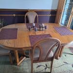 Oak dining table and 4 padded chairs